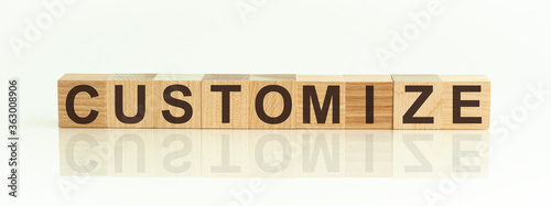 Photos word customize on wooden cubes on white background