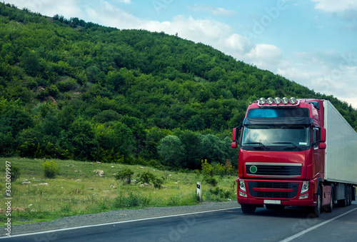  truck driving on a road. © Vahagn