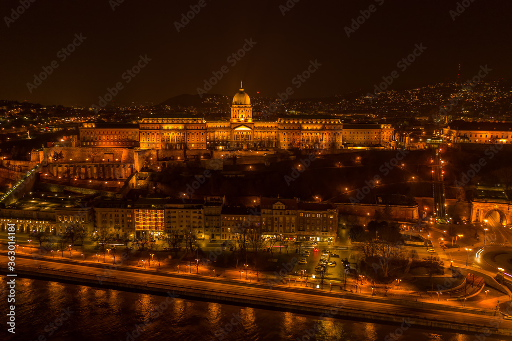 Aerial drone shot of Buda castle on Buda Hill in Budapest night with city lights on