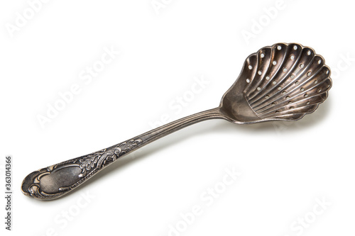 Fotografie Antique  spoon nickel silver isolated on white background.