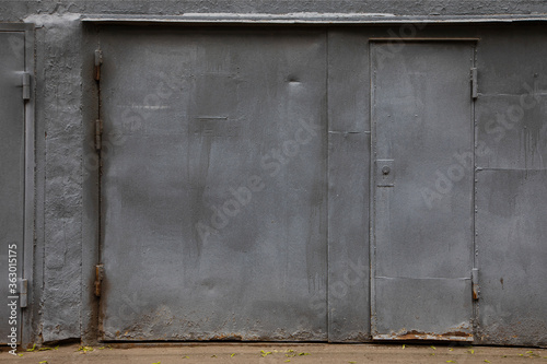 grey iron wall with door 