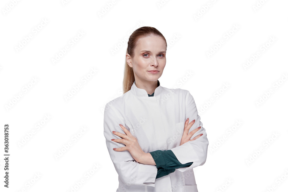 Smiling female doctor, hair gathered in a ponytail, looking at the camera. Smiling female doctor, hair gathered in a ponytail, looking at the camera.