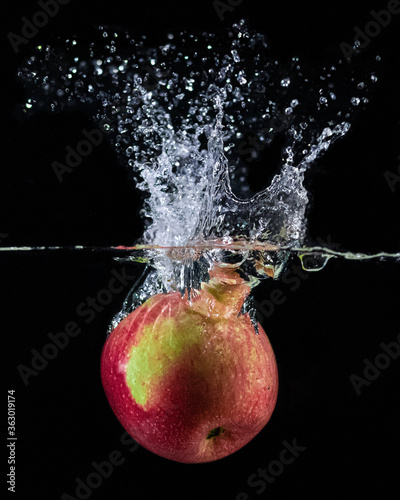Apple in water splash photography