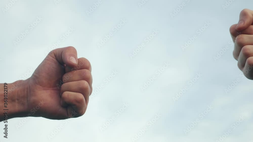 teamwork concept. fist to fist commit solidarity a respect and brotherhood gesture. business team hands fists close-up. people of different skin lifestyle colors partnership friendship teamwork teamwork concept. fist to fist commit solidarity a respect and brotherhood gesture. business team hands fists close-up. people of different skin lifestyle colors partnership friendship teamwork