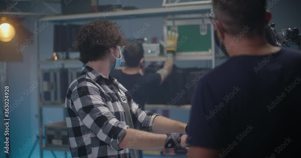 Costumer getting hard case in video equipment store Costumer getting hard case in video equipment store