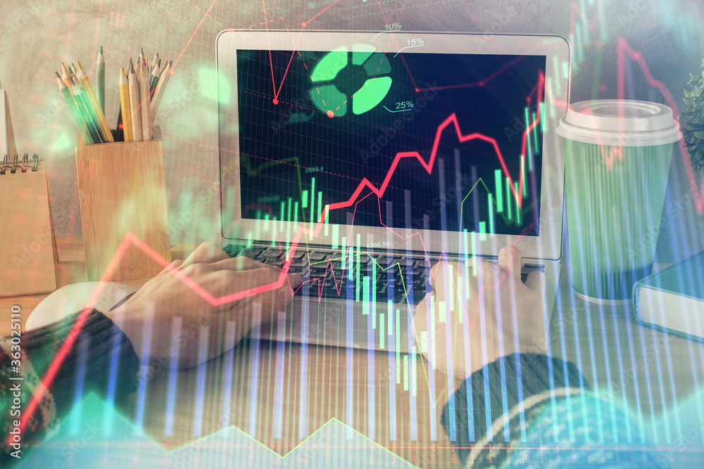 Double exposure of woman hands typing on computer and forex chart hologram drawing. Stock market invest concept. Double exposure of woman hands typing on computer and forex chart hologram drawing. Stock market invest concept.