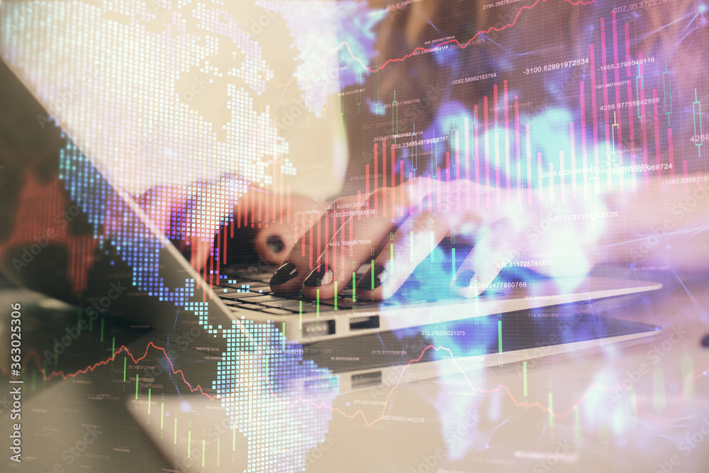 Double exposure of woman hands typing on computer and forex chart hologram drawing. Stock market invest concept. Double exposure of woman hands typing on computer and forex chart hologram drawing. Stock market invest concept.