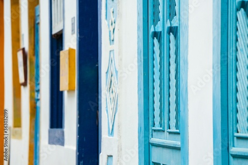 Selective focus shot of the wooden bright colorful doors captured in Brazil