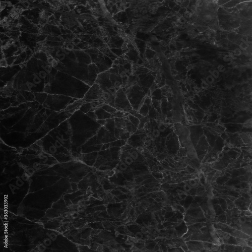 Black marble texture natural pattern for background. © peekeedee