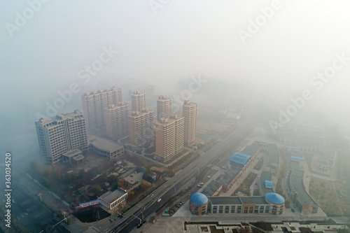 Urban buildings in haze