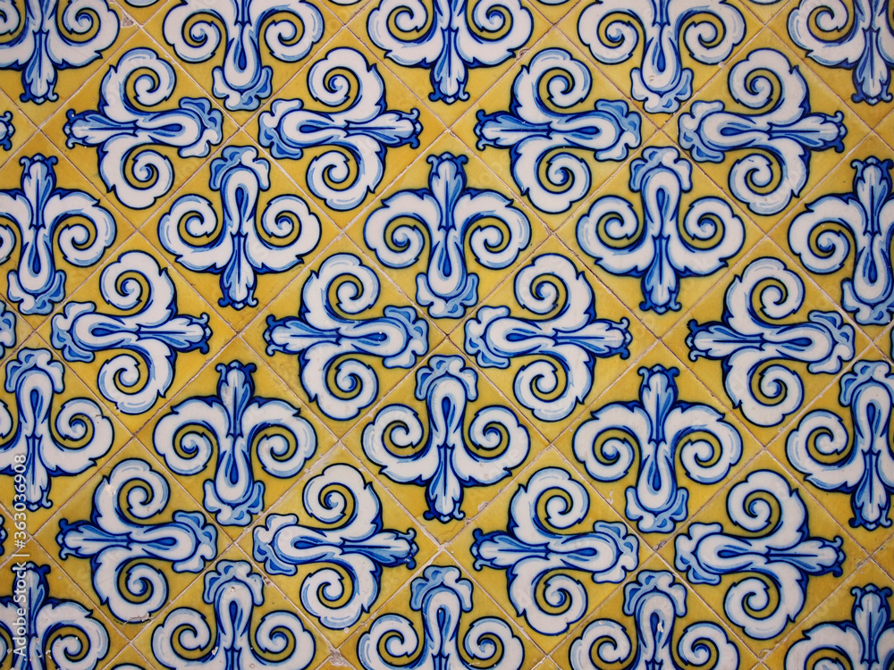Traditional spanish ceramic tiles. Vintage pattern on the facade of the Central Market in Valencia. Colorful background. Flower ornament.