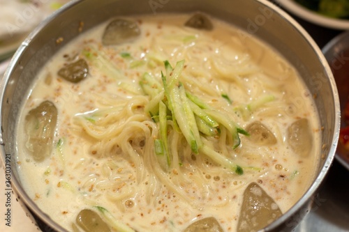Selective focus shot of Korean noodles soup