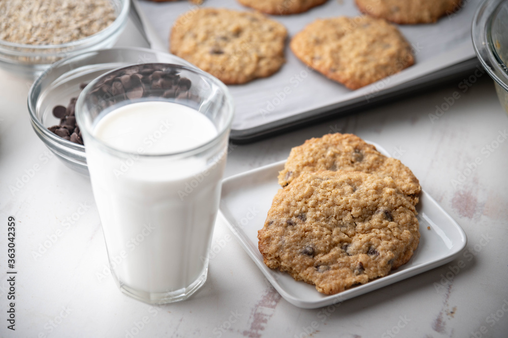 oatmeal cookie with a glass of milk oatmeal cookie with a glass of milk