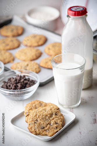oatmeal cookie with a glass of milk