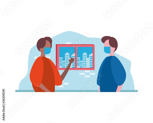 interracial young men wearing medical masks in the house