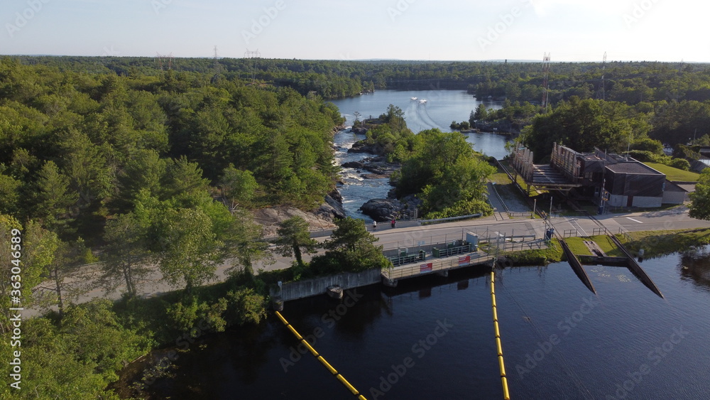 Panoramic Scenic View of Rapids in Muskoka, Ontario with fast-flowing river in nature landscape Panoramic Scenic View of Rapids in Muskoka, Ontario with fast-flowing river in nature landscape