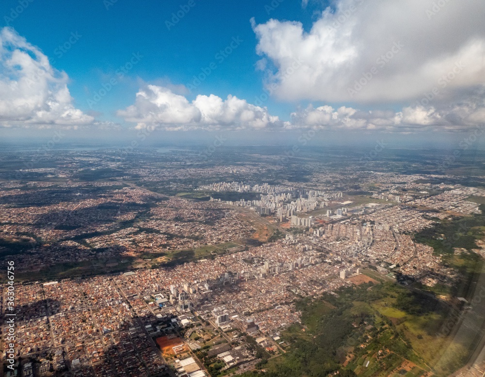 Aerial view of a city in Brazil from an airplane window