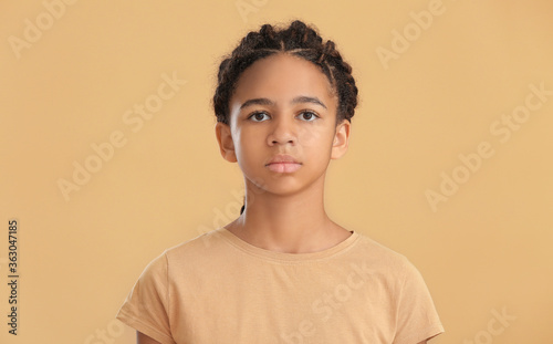 Sad African-American girl o...