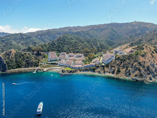 Aerial view of Hamilton Cove with apartment condo building on the cliff, Santa Catalina Island, famous tourist attraction in Southern California, USA photo