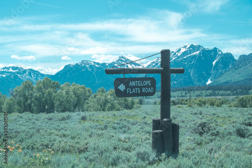Sign for Antelope Flats Road, in Grand Teton National Park. This is turnout for Morman Row and famous barns. Artistic filter applied photo