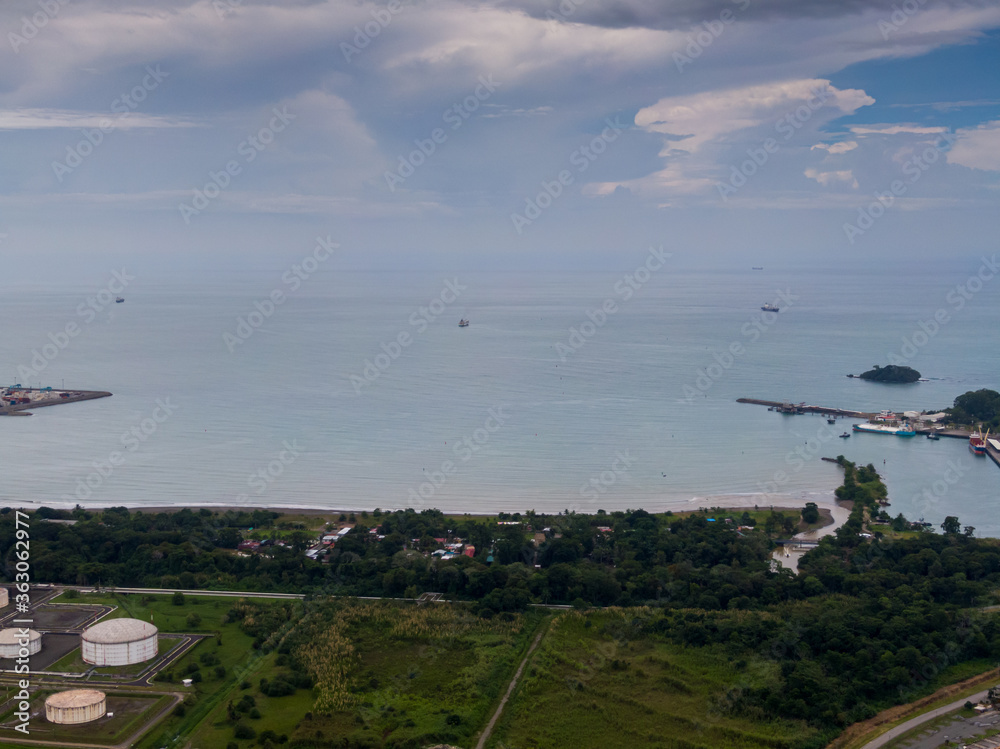 Fototapeta premium Beautiful aerial view of Limon downtown and its pier bay of Moin, APM and Limon in Costa Rica