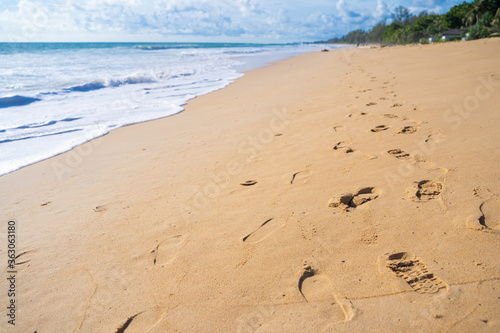 footprints on the peaceful beach