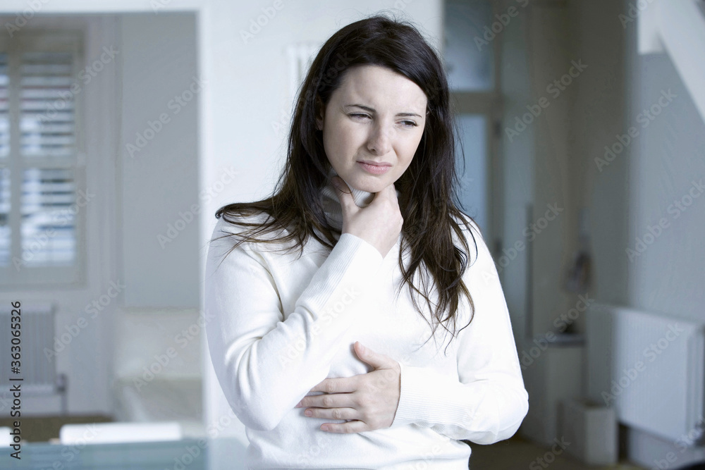 A woman with sore throat A woman with sore throat
