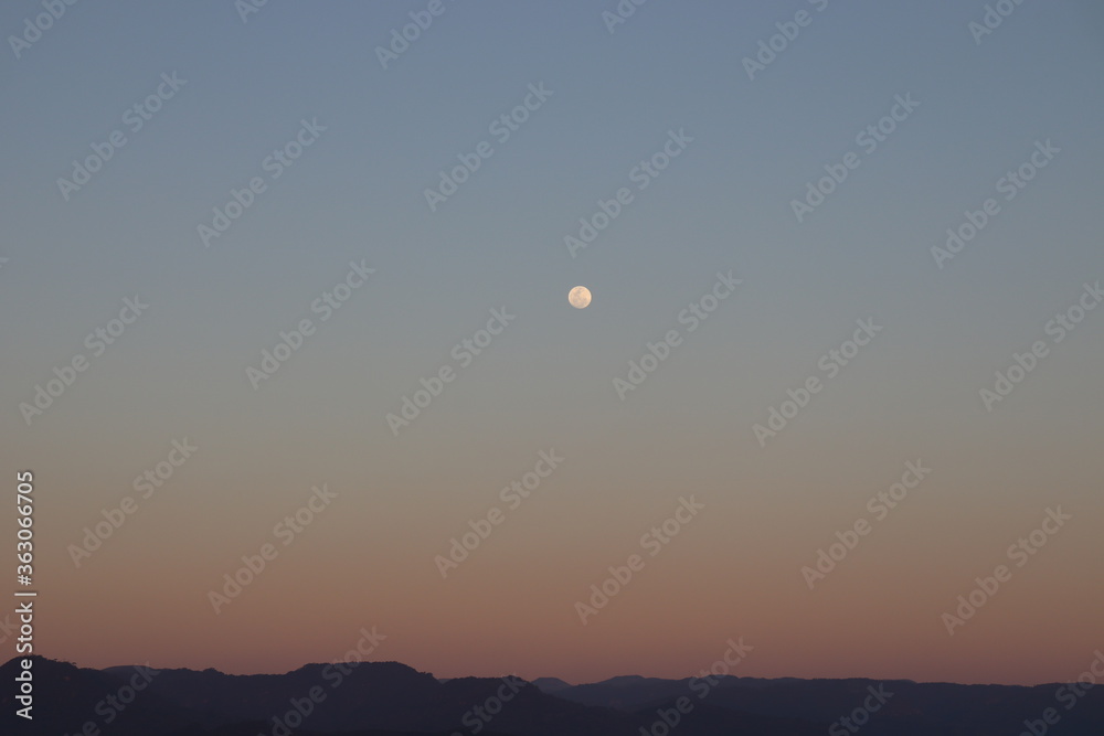 Moonrise and sunset.