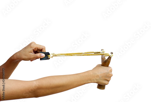 The hand is shooting a slingshot