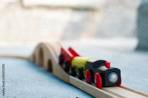 Wooden toy train on the play ground