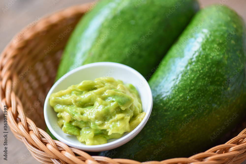 Avocado dip mashed on basket - Fruits healthy food concept Avocado dip mashed on basket - Fruits healthy food concept