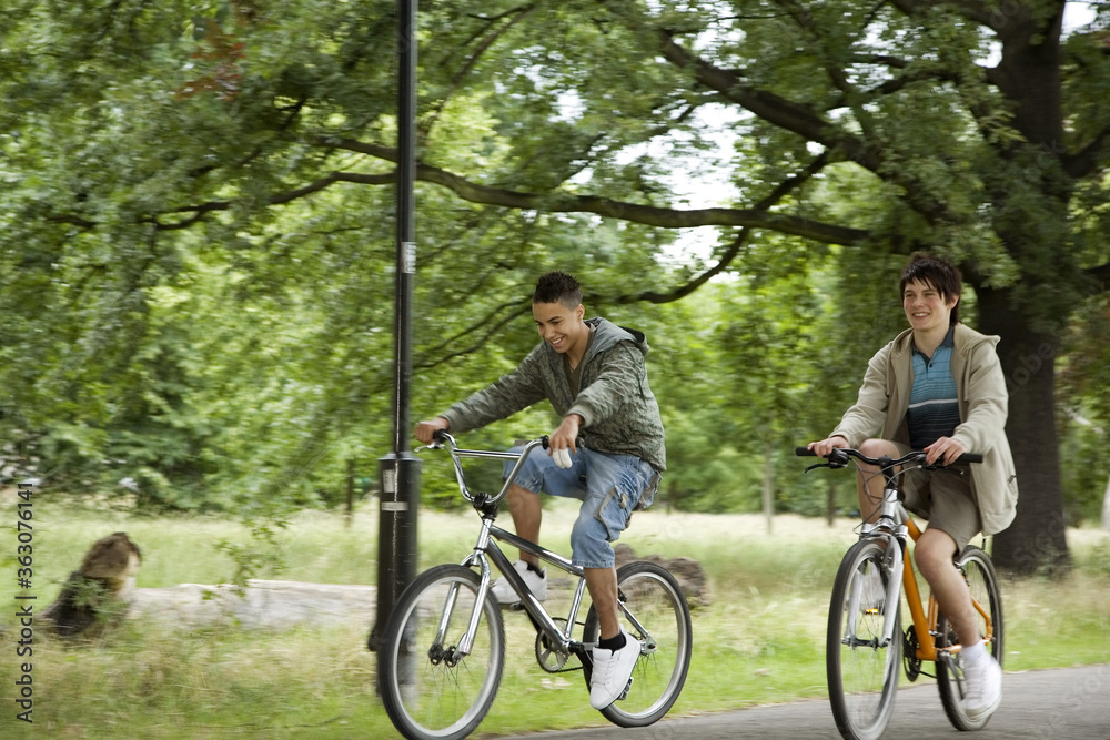 Boys cycling in the park