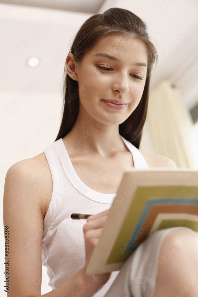 Woman writing diary Woman writing diary