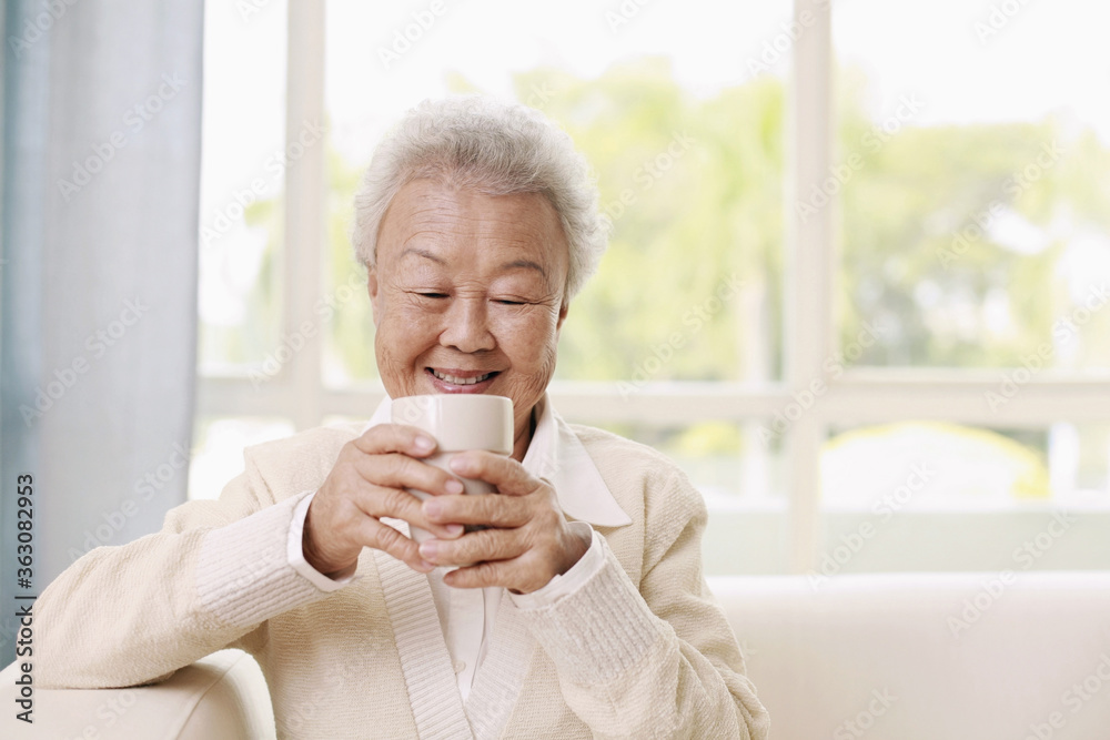 Senior woman enjoying a cup of coffee Senior woman enjoying a cup of coffee