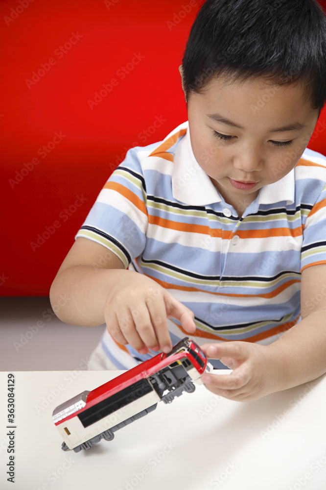 Boy playing with toy