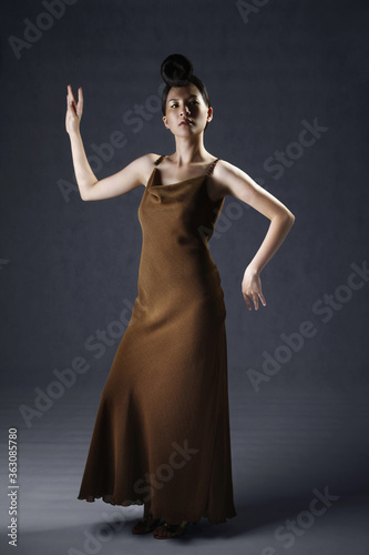 Woman posing in evening dress