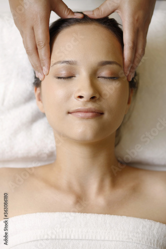 Woman enjoying a head massage