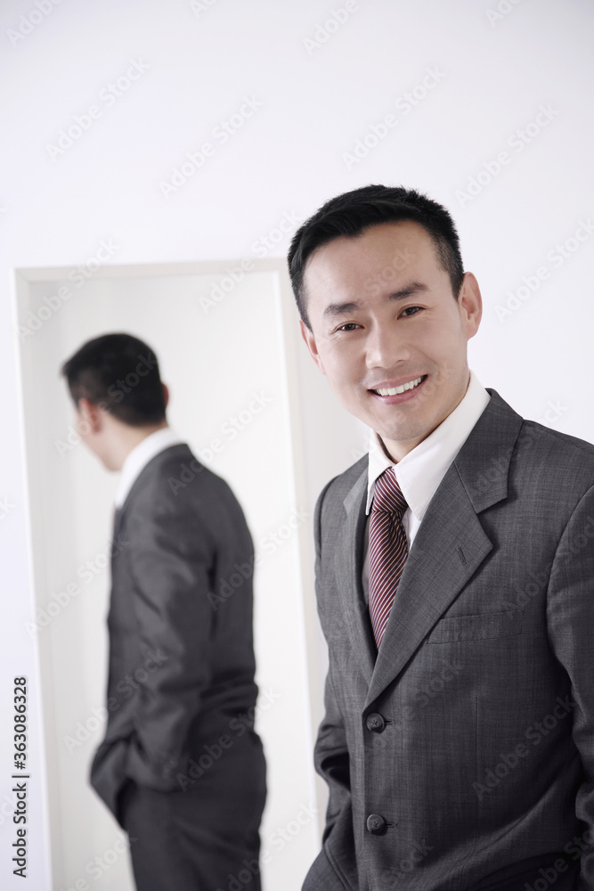 Businessman smiling at the camera Businessman smiling at the camera