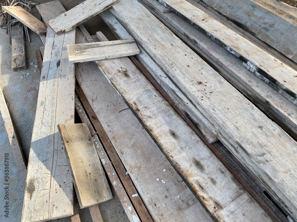 pile of big brown wood plank pile of big brown wood plank