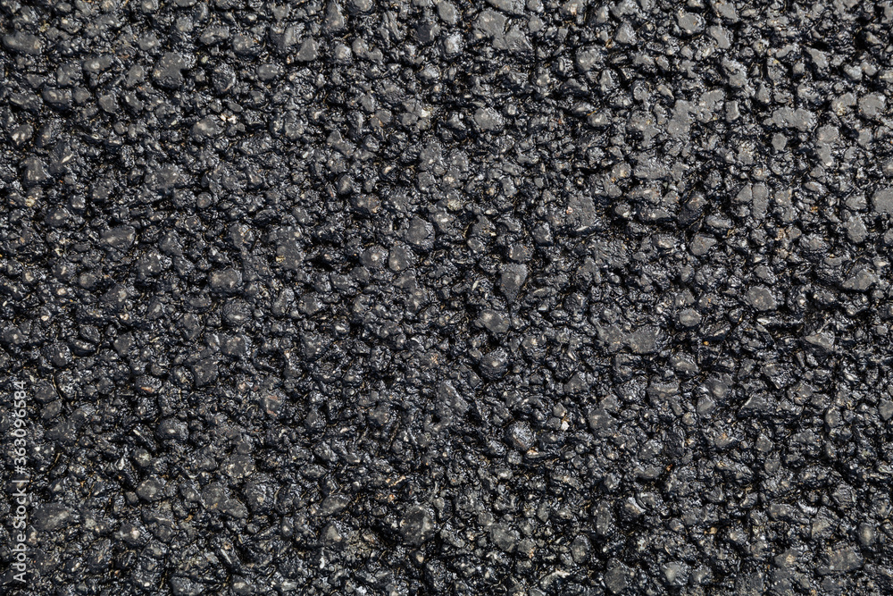 New asphalt. Textured, background. Flat lay. Close up New asphalt. Textured, background. Flat lay. Close up