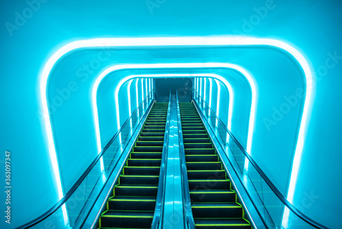 Mall escalator under blue light