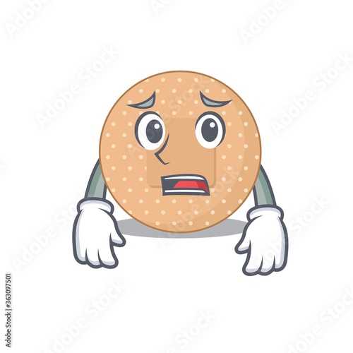 Cartoon image design rounded bandage showing worried face