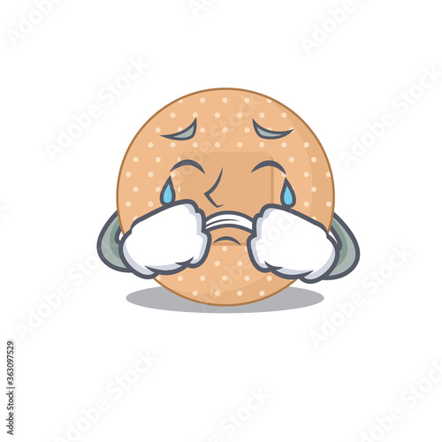 Caricature design style of rounded bandage with a sad face