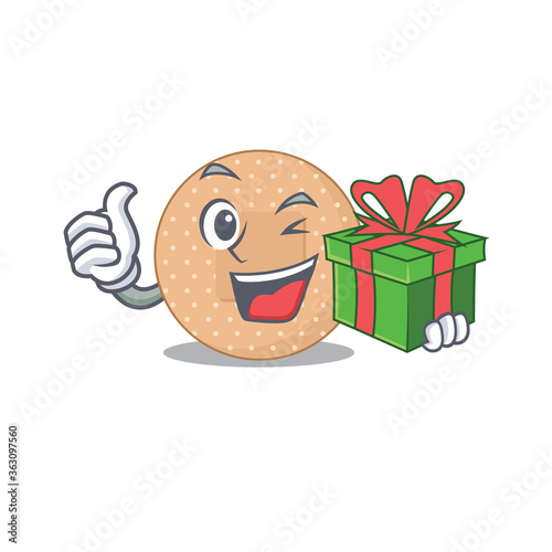 Rounded bandage cartoon character concept with a big gift box
