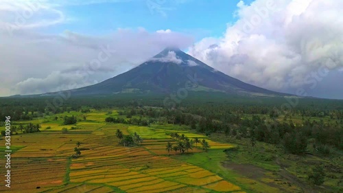 Landscape Of Mayon Volcano, Mount Mayon Renowned As The Perfect Cone And An Active Stratovolcano In Albay, Bicol. - aerial drone photo