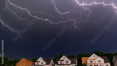 Lightning over houses