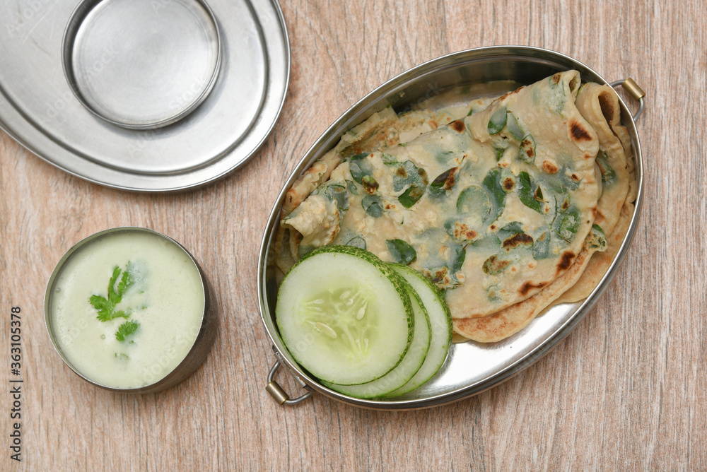 Wheat Dosa, goduma dosa Chilli, curry leaf top view. Low fat South Indian dish best with coconut