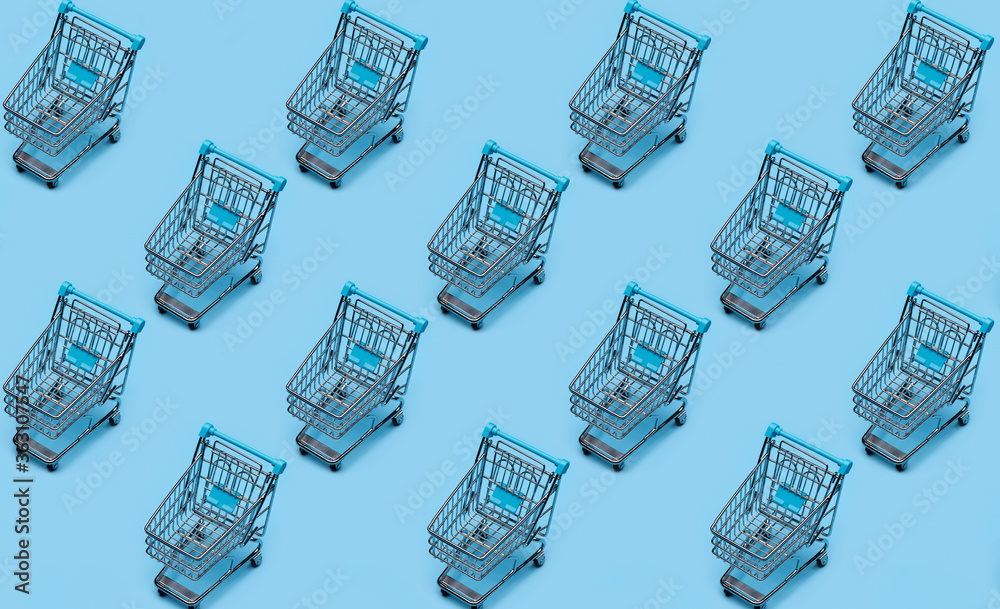 Background pattern.Metal shopping cart (toy), cloned on blue background.