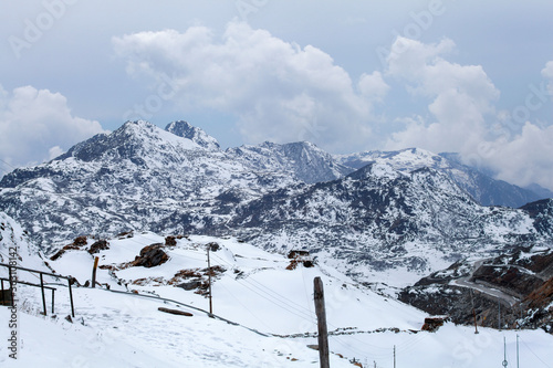 Snowy white peaks of Nathula Pass at Sikkim, India