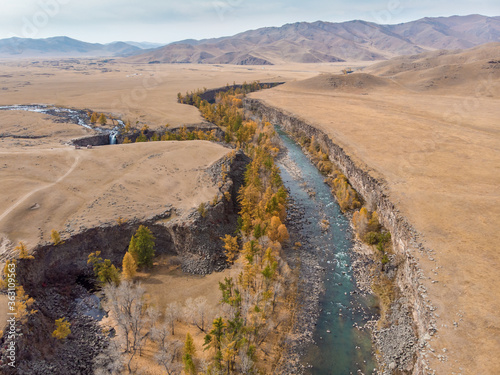 Drone capture of the Orkhon river and waterfall in national park during autumn, Mongolia 